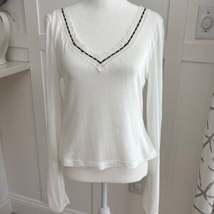 Free People ivory top with black ribbon